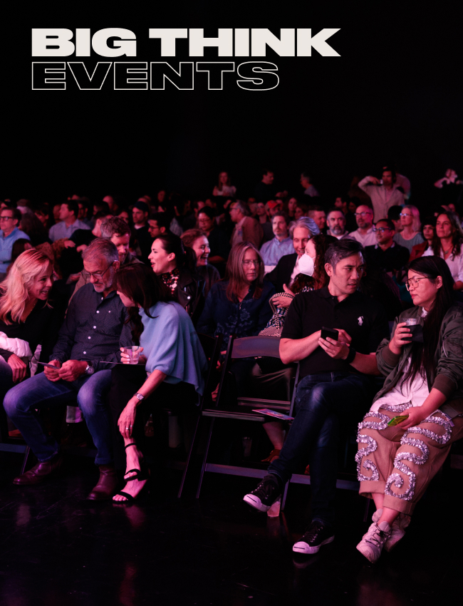 A seated audience waits at an indoor event under pink lighting. The words "BIG THINK EVENTS" appear at the top left of the image.