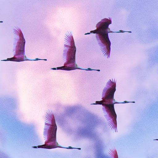 a flock of pink birds flying through a cloudy sky.